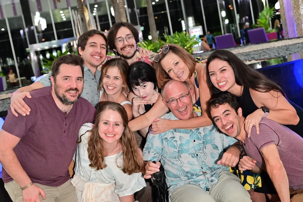 the Birkel family gathered around Jeff in Cancun
